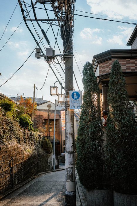 Tokyo ciclista strisce pedonali, fotografia di viaggio e street photography in Giappone
